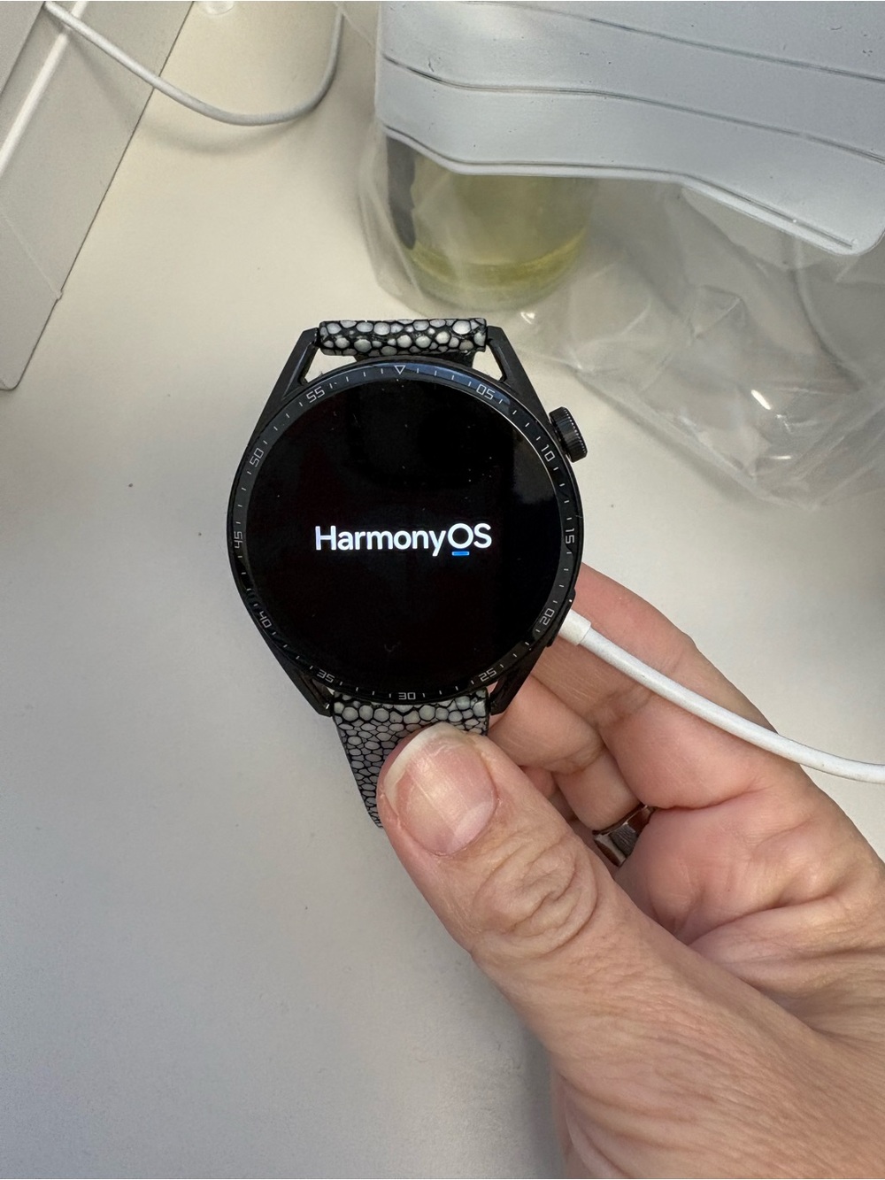 Huawei GT3 smartwatch with leather band and accessories